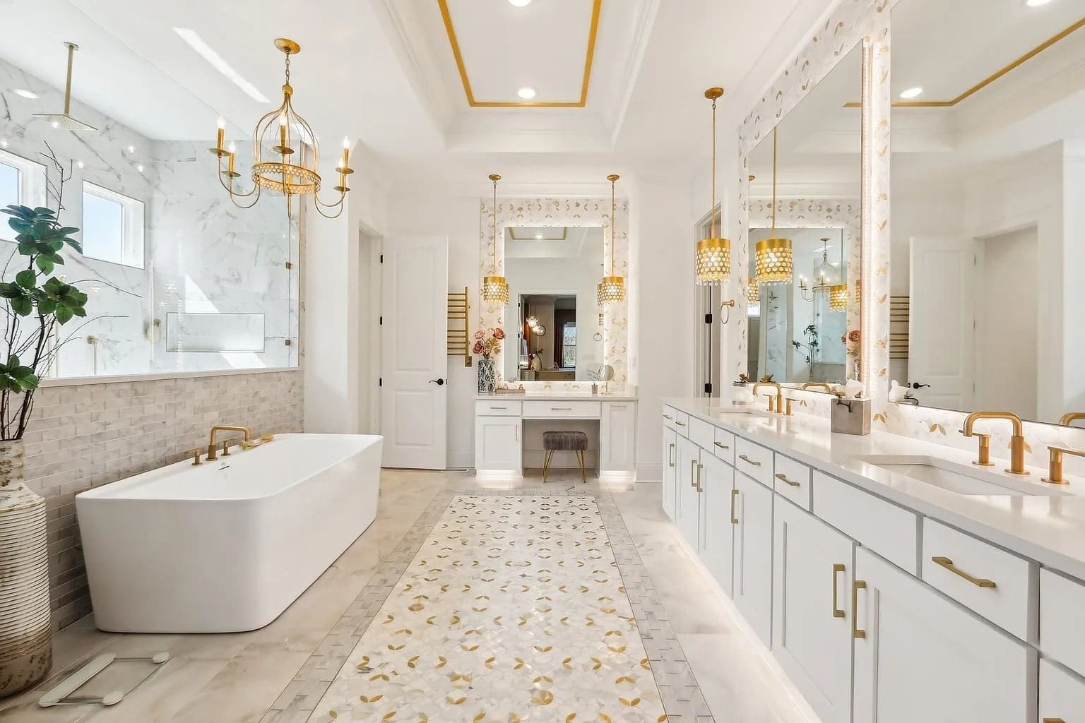 Luxurious bathroom with a freestanding tub, double vanity, gold fixtures, and elegant lighting.
