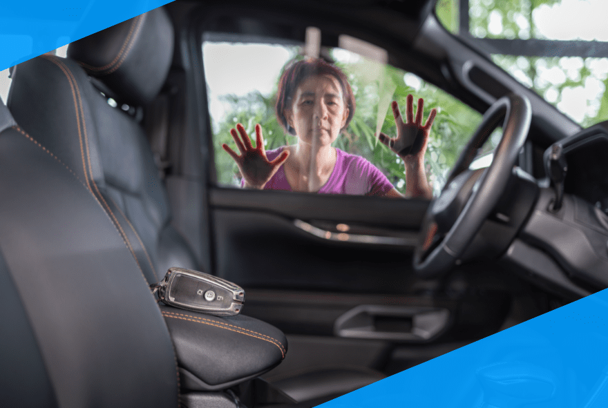 Woman locked out of car, looking through window at keys on seat.