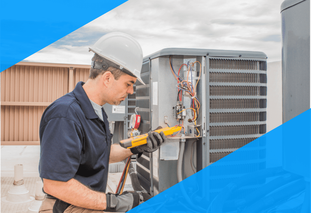 'Technician inspecting HVAC unit with a multimeter on a rooftop, wearing a hard hat and gloves.'