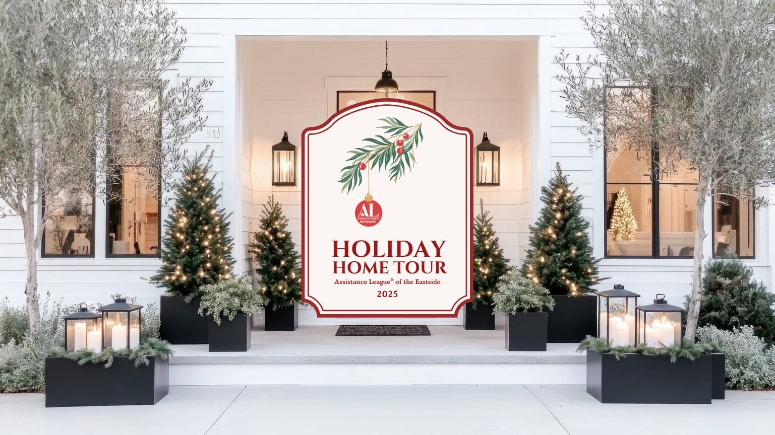 Front porch decorated with lit Christmas trees and lanterns, featuring 'Holiday Home Tour 2025' sign.